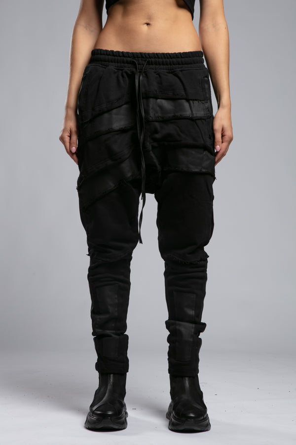 Layered black avant garde jogger pant front view