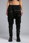 Layered black avant garde jogger pant front view