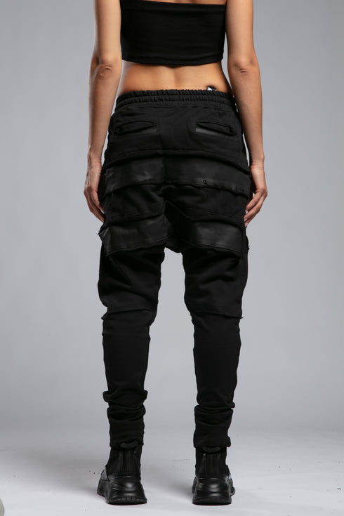 Back view avant garde black designer pants