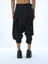 Junus Coban men’s black drop-crotch capri pants back view