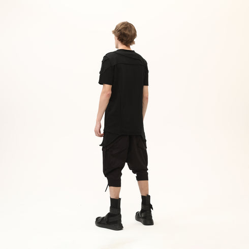Junus Coban Men’s Multi-Pleated Capri Trousers with Piped Skirted Pockets utility pocketed pleated avant garde capri