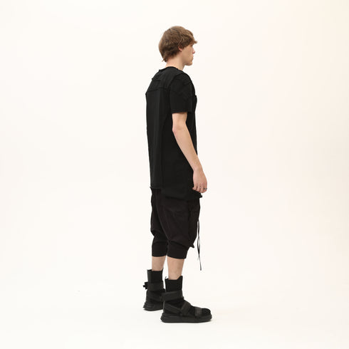 Junus Coban Men’s Multi-Pleated Capri Trousers with Piped Skirted Pockets utility pocketed pleated avant garde capri