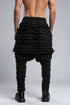Junus Coban Men's Denim Detail Pants in Acid Black back view with layered raw-edge detailing