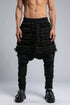 Junus Coban Men's Denim Detail Pants in Acid Black close front view showing layered denim-style texture