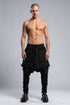 Junus Coban Men's Denim Detail Pants in Acid Black front view with dropped silhouette and layered distressed detailing