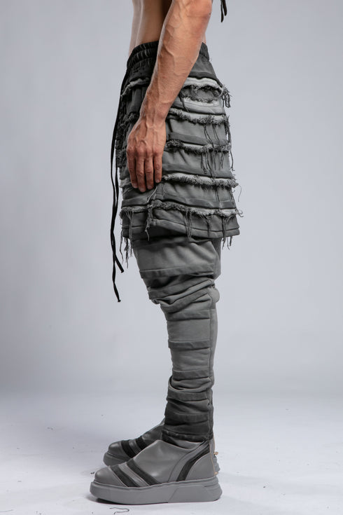 Junus Coban Men's Denim Detail Pants in Acid Grey side view with dropped crotch and textured panel construction