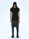 Front view of men’s black hooded multi-pleated T-shirt with short sleeves and bold avant-garde streetwear styling.