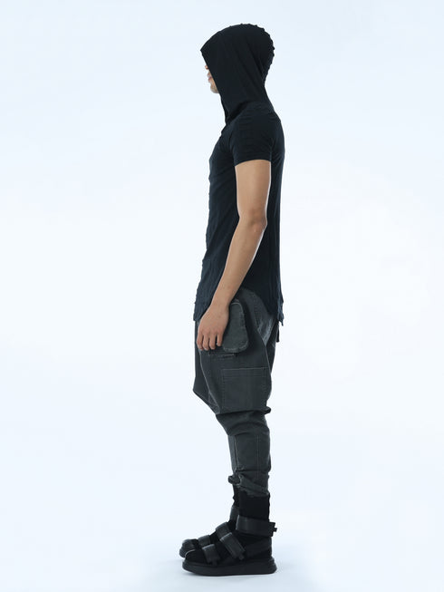 Side view of men’s black hooded multi-pleated T-shirt with slim regular fit and festival streetwear attitude.