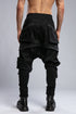 Junus Coban Men's Multi-Pocket Pants in Black back view with utility pocket construction