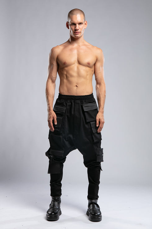 Junus Coban Men's Multi-Pocket Pants in Black front view with dropped silhouette and oversized utility pockets