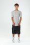 Front view of men’s grey paneled raw seam T-shirt with crew neck, short sleeves and clean avant-garde silhouette.