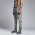 Side view of men’s anthracite drop-crotch shalwar pants with relaxed upper fit and slim lower-leg silhouette.