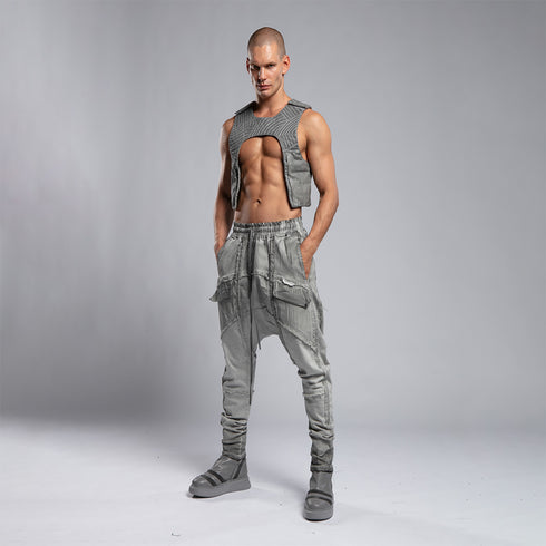Styling view of men’s anthracite shalwar pants with bold avant-garde streetwear attitude.