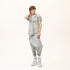 Fashion look of men’s anthracite raw seam T-shirt with sculptural shoulders and Junus Coban attitude.