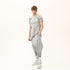 Styling view of men’s anthracite raw seam T-shirt designed for festival and avant-garde streetwear outfits.