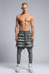 Junus Coban Men's Ribbed Raw Seam Pants in Grey front view with layered raw-edge detailing and dropped silhouette