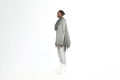 Oversized fit of minimalist women’s hooded tunic