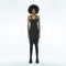 Back view of women’s black strapless drop-crotch jumpsuit with adjustable shoulder straps and slim lower-leg fit.