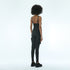 Front view of women’s black strapless drop-crotch jumpsuit with front zipper, adjustable straps and bold festival-ready look.
