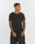 Men's Raw Seam T-shirt in Acid Black close view showing washed texture and exposed seams