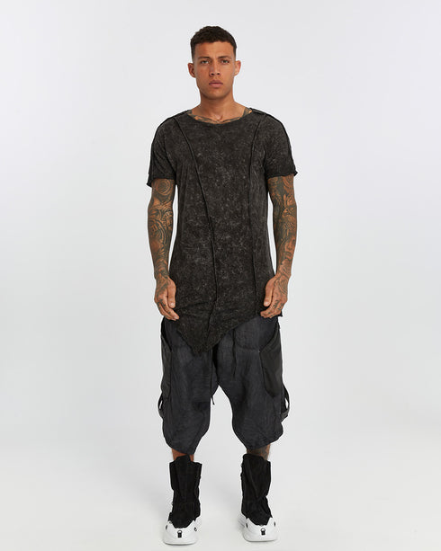 Men's Raw Seam T-shirt in Acid Black front view with pointed hem and exposed seam detail
