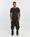 Men's Raw Seam T-shirt in Acid Black front view with pointed hem and exposed seam detail