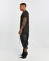 Men's Raw Seam T-shirt in Acid Black side view with longline silhouette