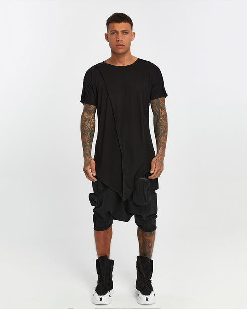 Men's Raw Seam T-shirt in Black front view with pointed hem and exposed seam detail