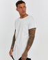 Men's Raw Seam T-shirt in White angled view showing exposed seam lines