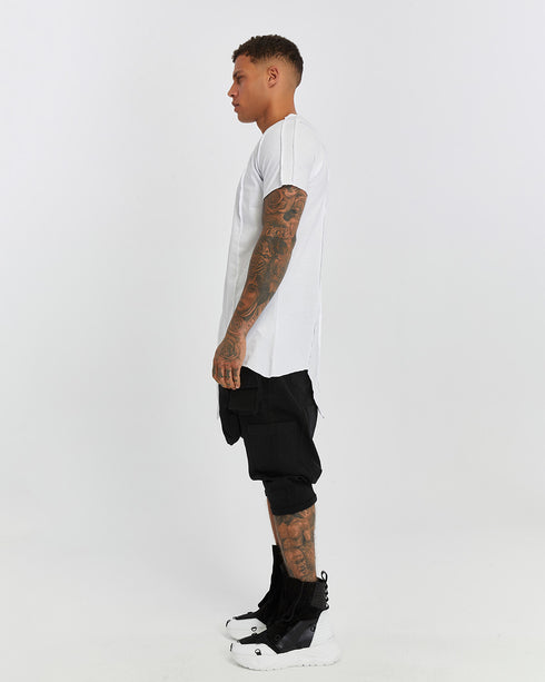 Men's Raw Seam T-shirt in White side view with longline silhouette